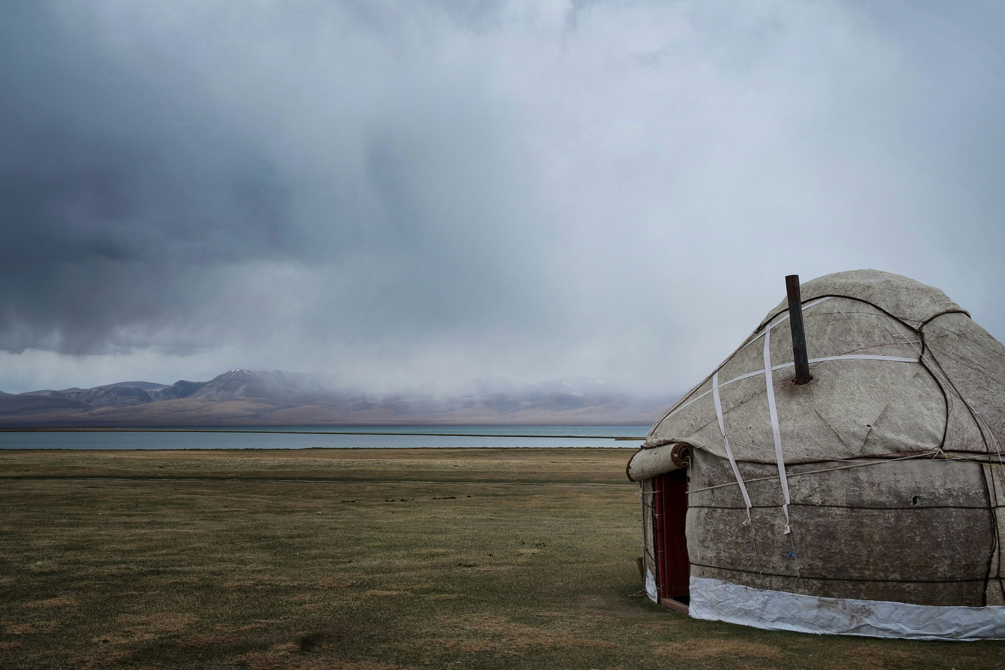 Issyk-Kul lake sourrounded by mountains in Kyrgyzstan