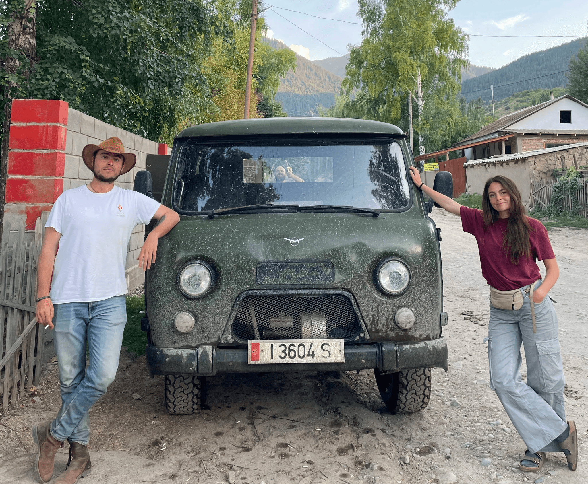 4x4 support vehicle crossing mountain roads in Kyrgyzstan